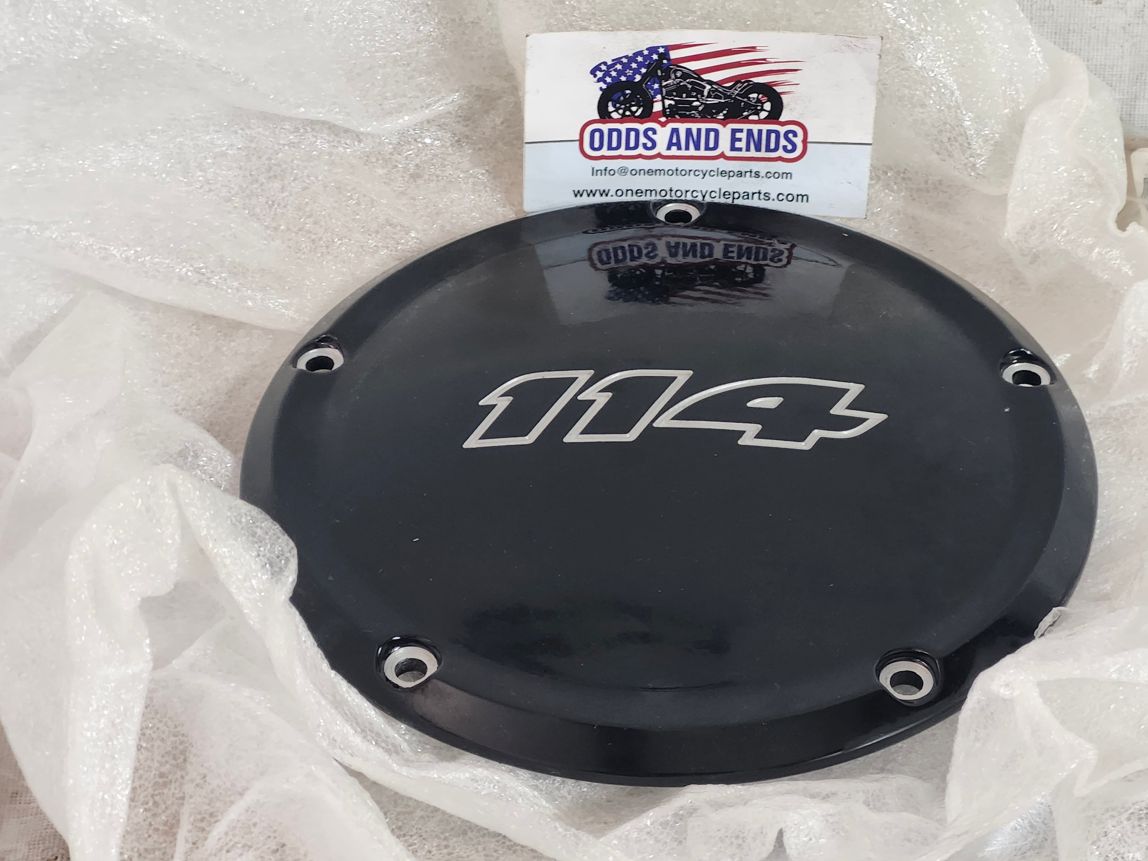 Black mechanical part with '114' branding on a white background